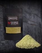 Schale mit grünem Pfeffer Dip und Pfefferkörnern