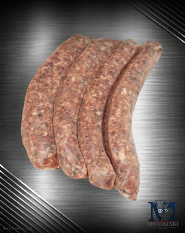 Michalski grobe Bratwurst vom Landschwein roh auf dunklem Steinuntergrund